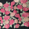 Tessuto jacquard in jersey floreale nero rosa rosso